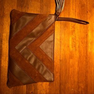 Carlos By Carlos Santana clutch bag.